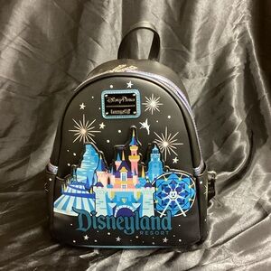 Loungefly Black Backpack with Colorful Disneyland Graphics